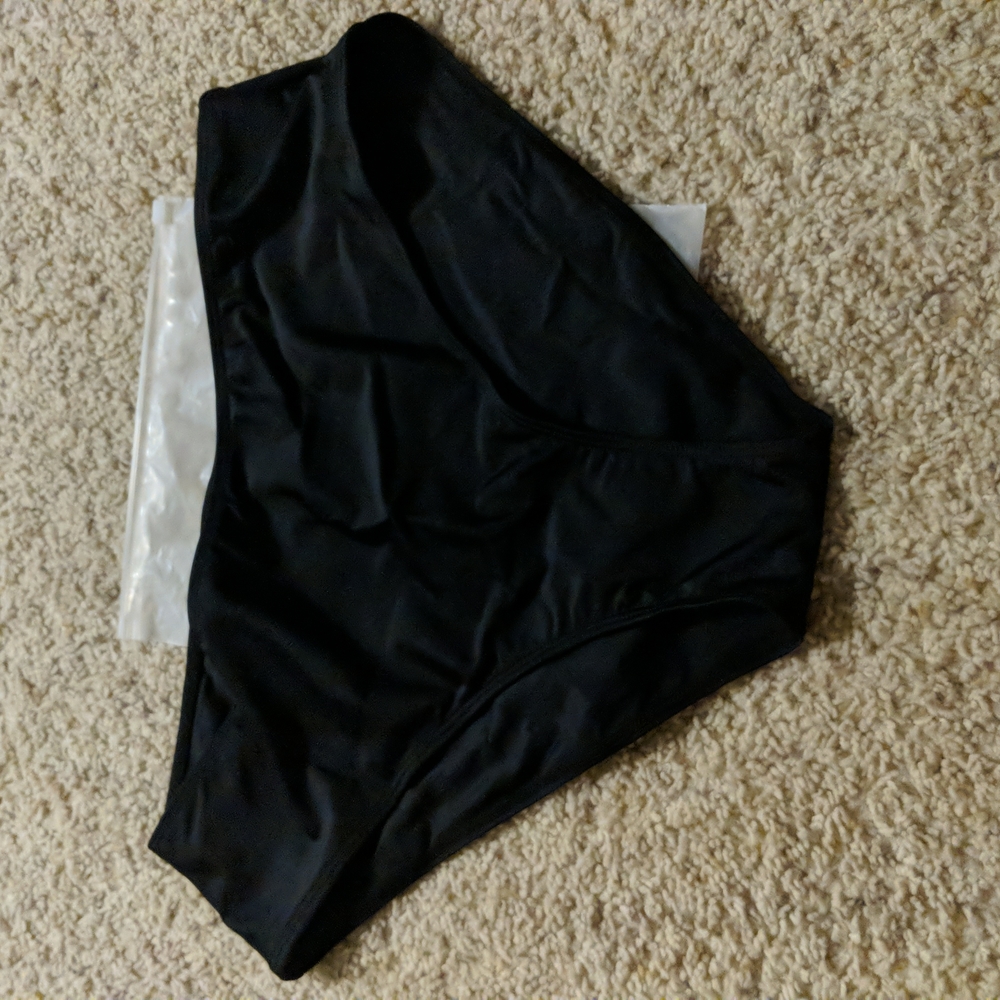 Brand New Black swim suit bottoms. XXL never tried on
